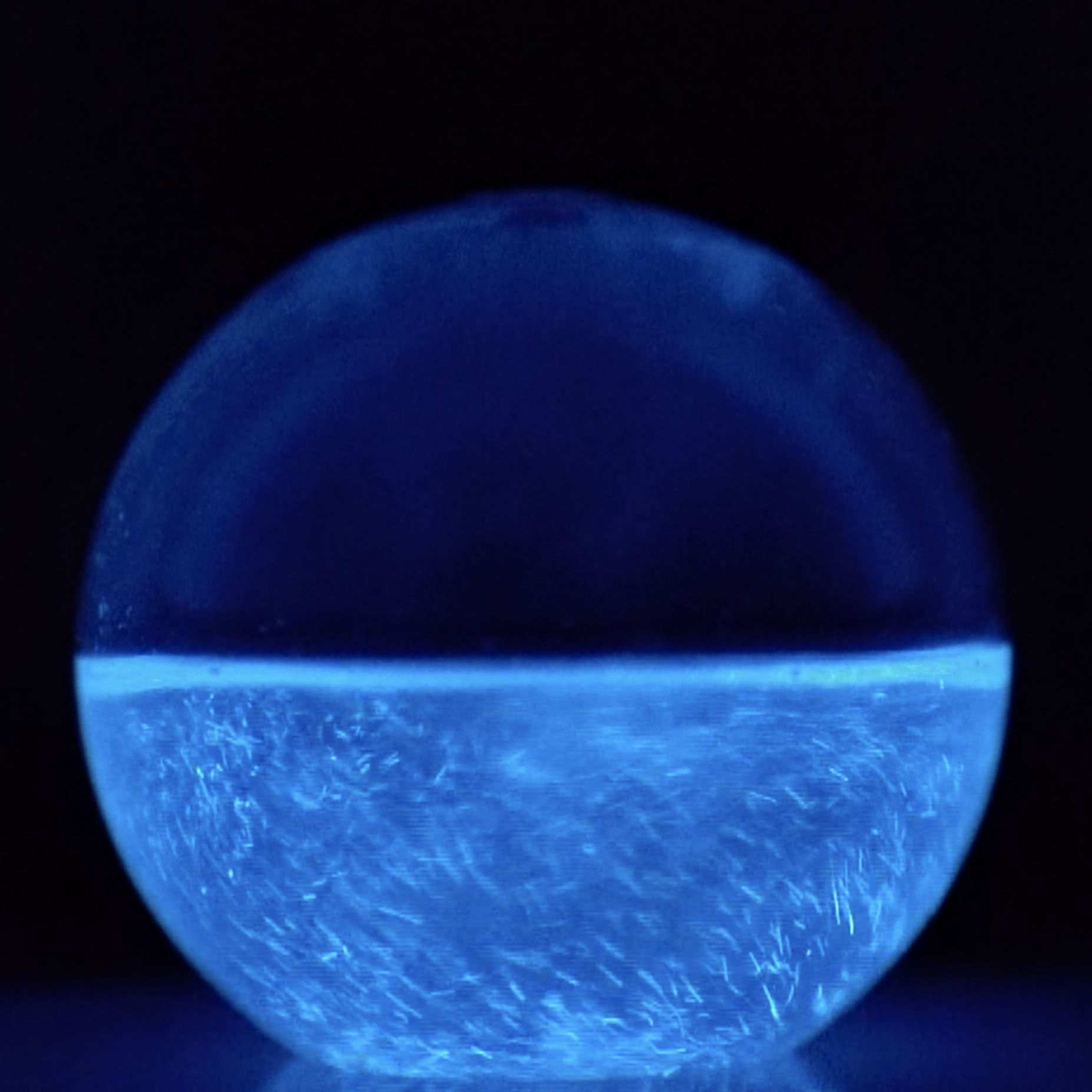 The Bioluminescent Bio-Orb on a stir plate