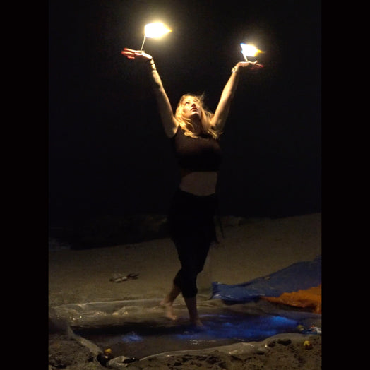 Fire girl on beach