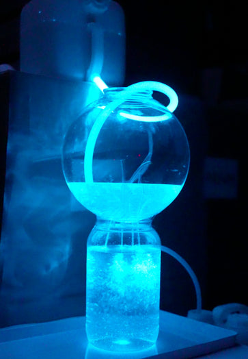 Ten 10 Liter PyroDino carboy powering bioluminescent fountain